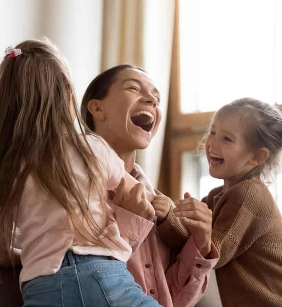 A parent playing with kids